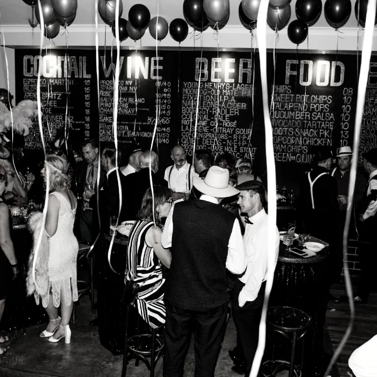 Guests celebrating a 50th birthday at a Richmond function venue with a Gatsby theme